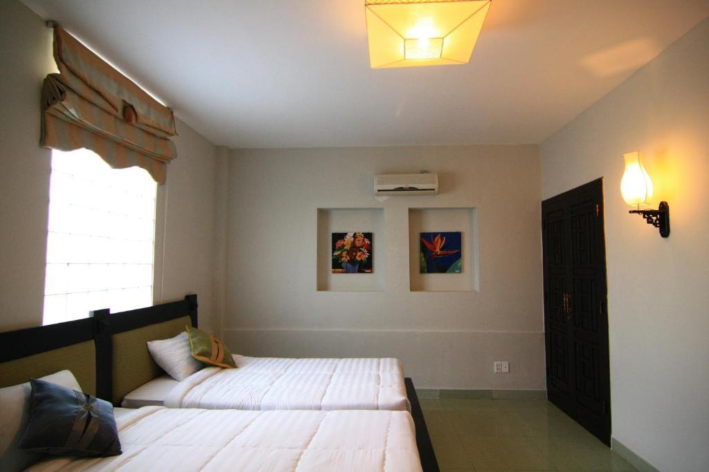Faifoo Boutique Hotel Ho Chi Minh-stad Kamer foto